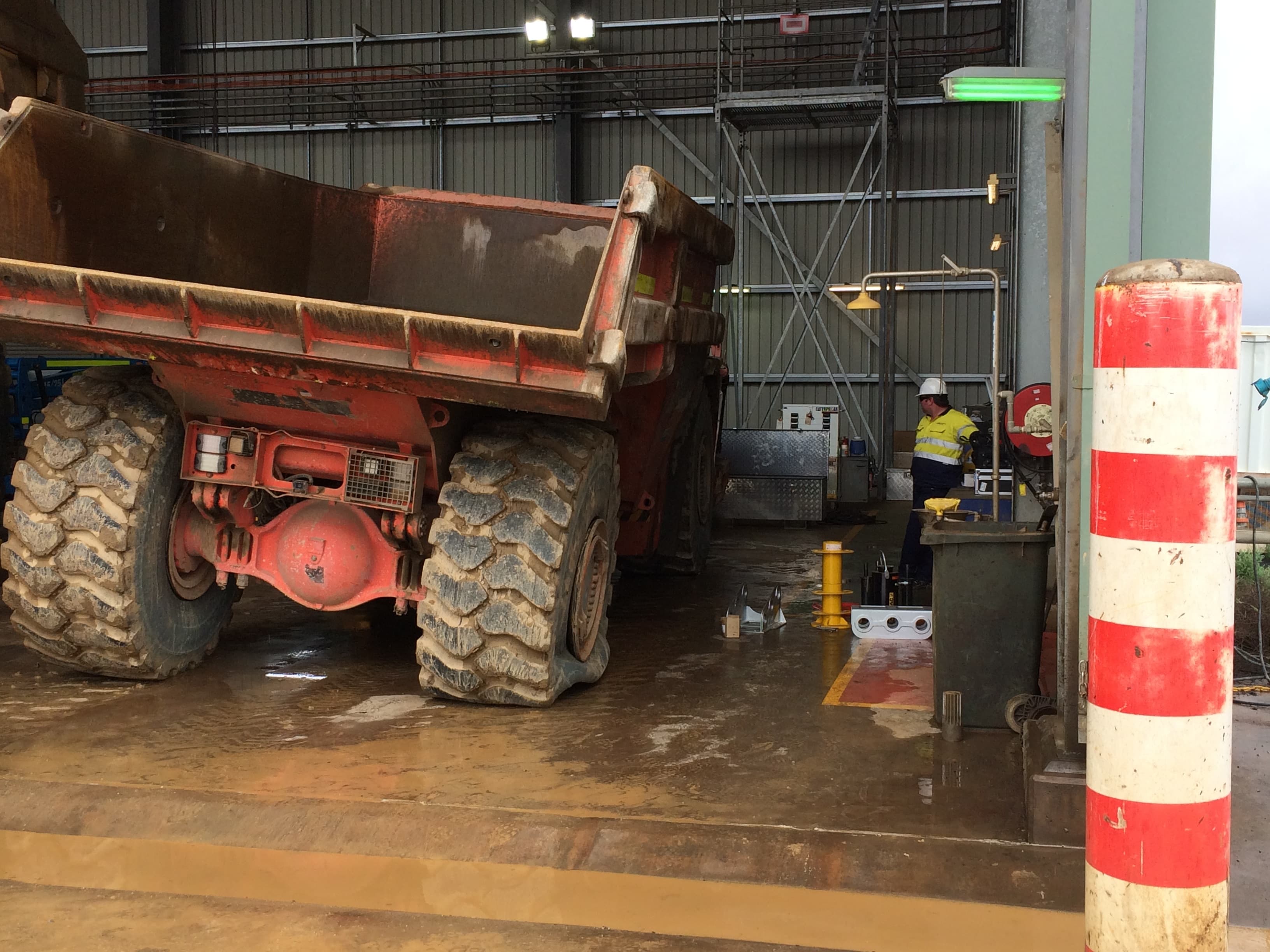 Lifting an Underground Mining Truck to Fix a Flat Tyre